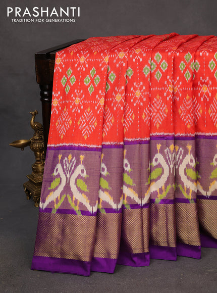 Pochampally silk saree orange and violet with allover ikat weaves and long ikat woven zari border