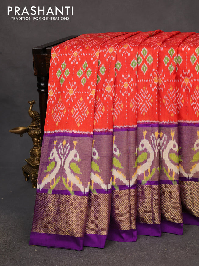 Pochampally silk saree orange and violet with allover ikat weaves and long ikat woven zari border