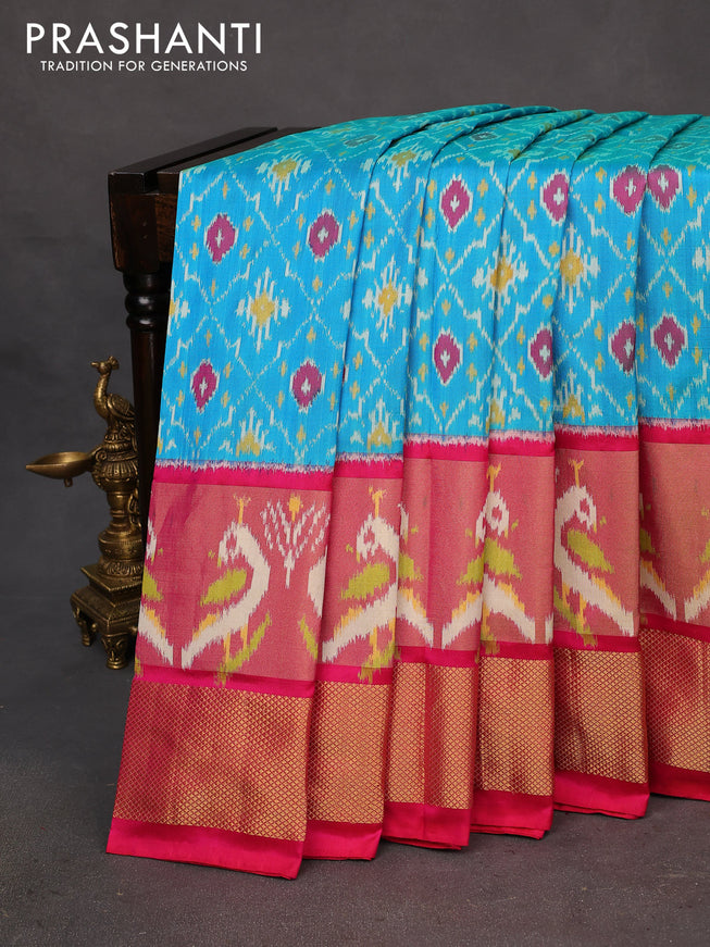 Pochampally silk saree cs blue and reddish pink with allover ikat weaves and long ikat woven zari border