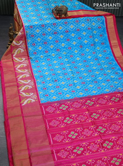 Pochampally silk saree cs blue and reddish pink with allover ikat weaves and long ikat woven zari border