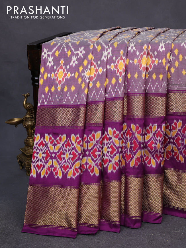 Pochampally silk saree purple shade and purple with allover ikat weaves and long ikat woven zari border