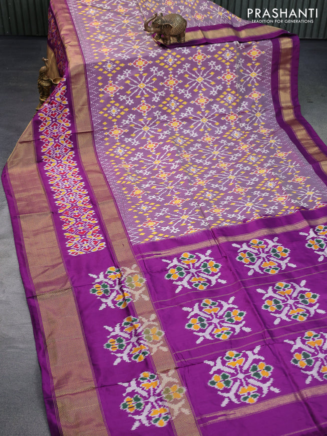 Pochampally silk saree purple shade and purple with allover ikat weaves and long ikat woven zari border