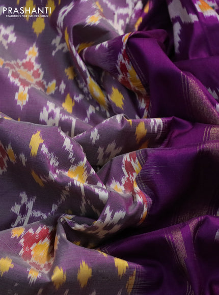 Pochampally silk saree purple shade and purple with allover ikat weaves and long ikat woven zari border