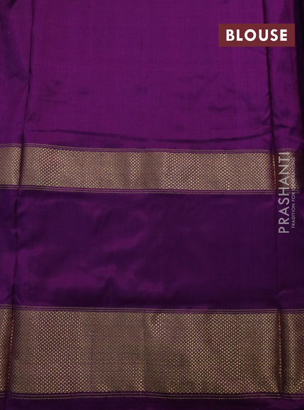 Pochampally silk saree purple shade and purple with allover ikat weaves and long ikat woven zari border