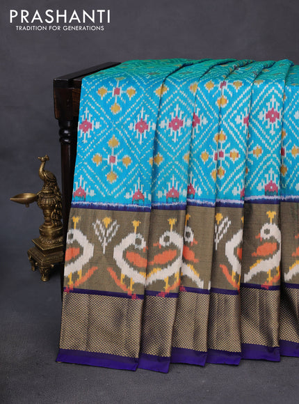 Pochampally silk saree cs blue and dark blue with allover ikat weaves and long ikat woven zari border