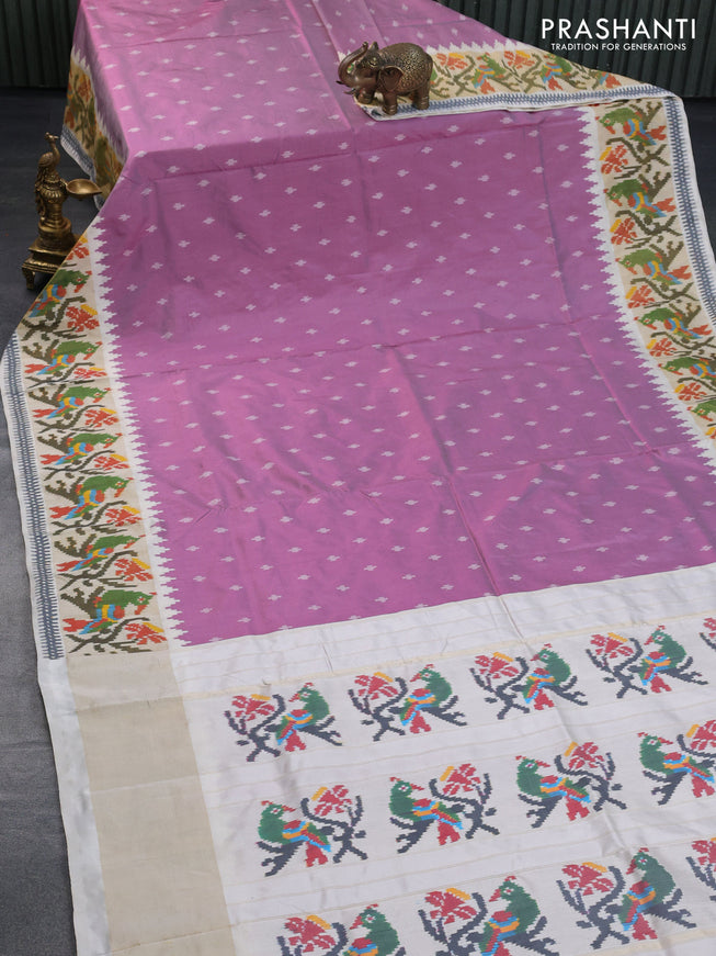 Pochampally silk saree lotus pink and cream with allover ikat butta weaves and temple design ikat woven zari border