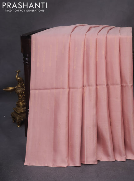 Kanchipuram soft silk saree pastel peach and red with allover zari weaves in borderless style