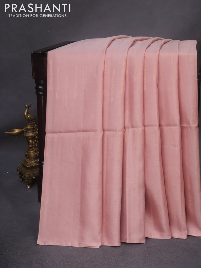 Kanchipuram soft silk saree pastel peach and red with allover zari weaves in borderless style