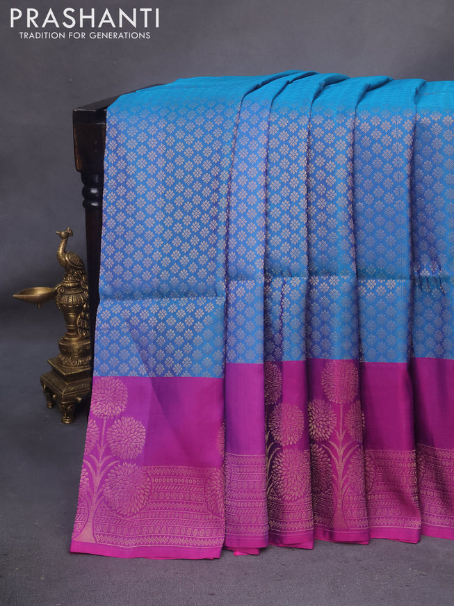 Kanchipuram soft silk saree dual shade of cs blue and purple with allover zari woven brocade weaves and floral deisgn zari woven border