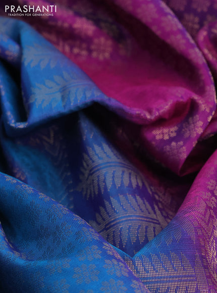 Kanchipuram soft silk saree dual shade of cs blue and purple with allover zari woven brocade weaves and floral deisgn zari woven border