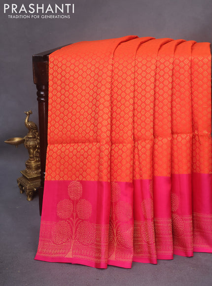 Kanchipuram soft silk saree orange and pink with allover zari woven brocade weaves and floral deisgn zari woven border