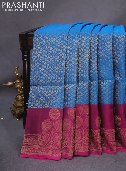 Kanchipuram soft silk saree cs blue and magenta pink with allover zari woven brocade weaves and floral deisgn zari woven border