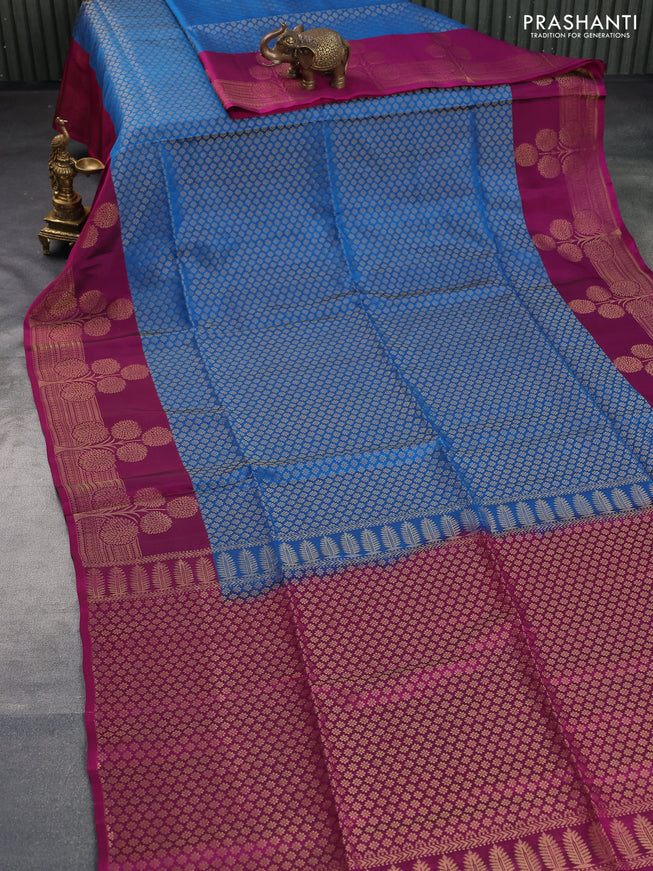 Kanchipuram soft silk saree cs blue and magenta pink with allover zari woven brocade weaves and floral deisgn zari woven border