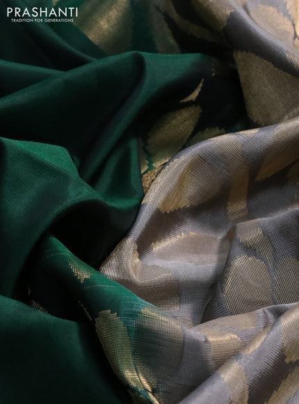 Kanchipuram soft silk saree dark green and grey with floral zari woven buttas and long zari woven border