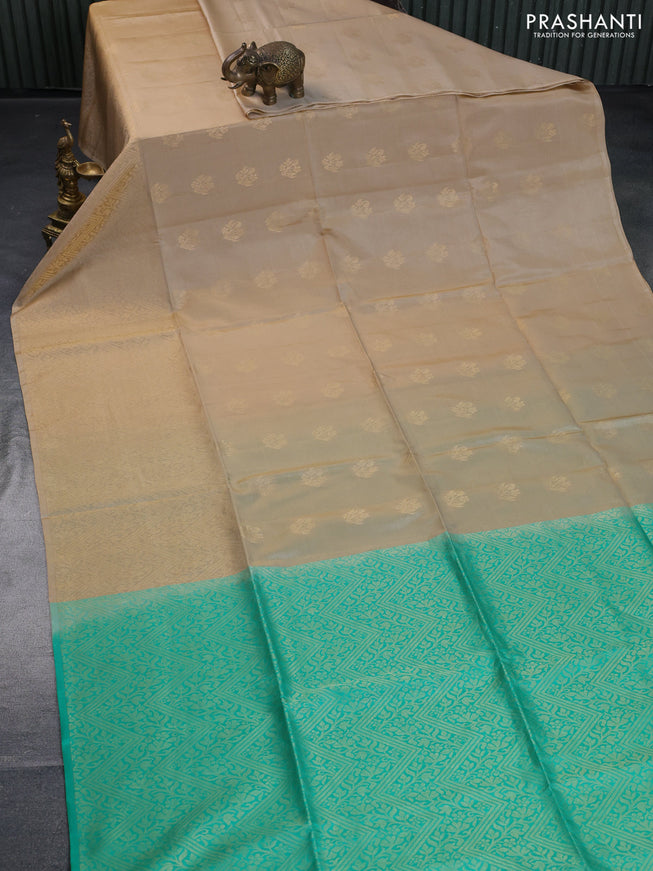 Kanchipuram soft silk saree sandal and teal green with zari woven buttas and long zari woven border