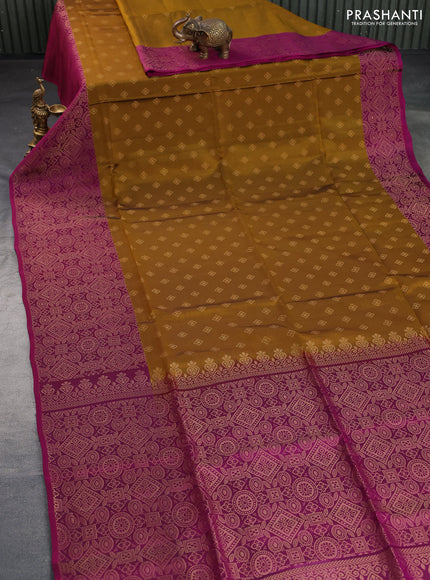 Kanchipuram soft silk saree dark mustard and dark magenta pink with zari woven buttas and long zari woven border