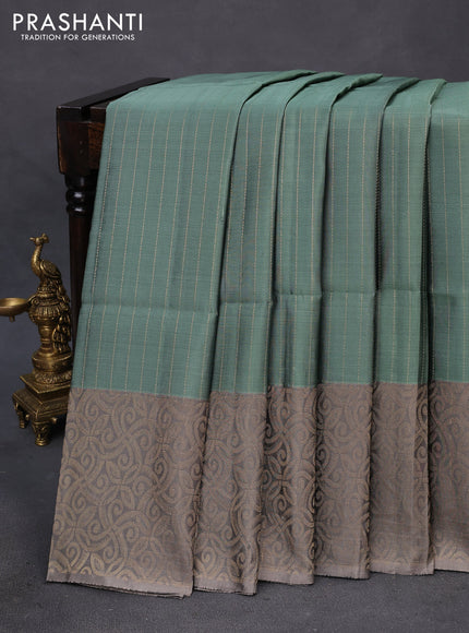 Kanchipuram soft silk saree pastel green and grey with allover zari stripe weaves and long zari woven border