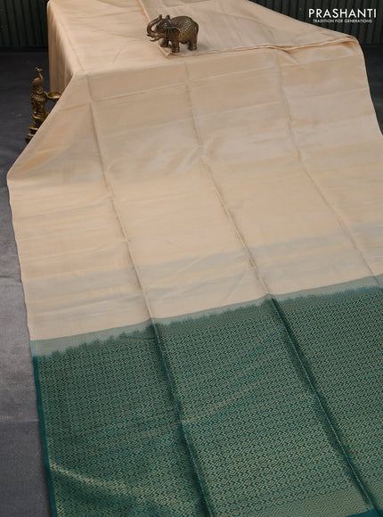 Kanchipuram soft silk saree cream and dark green with allover zari weaves & buttas in borderless style