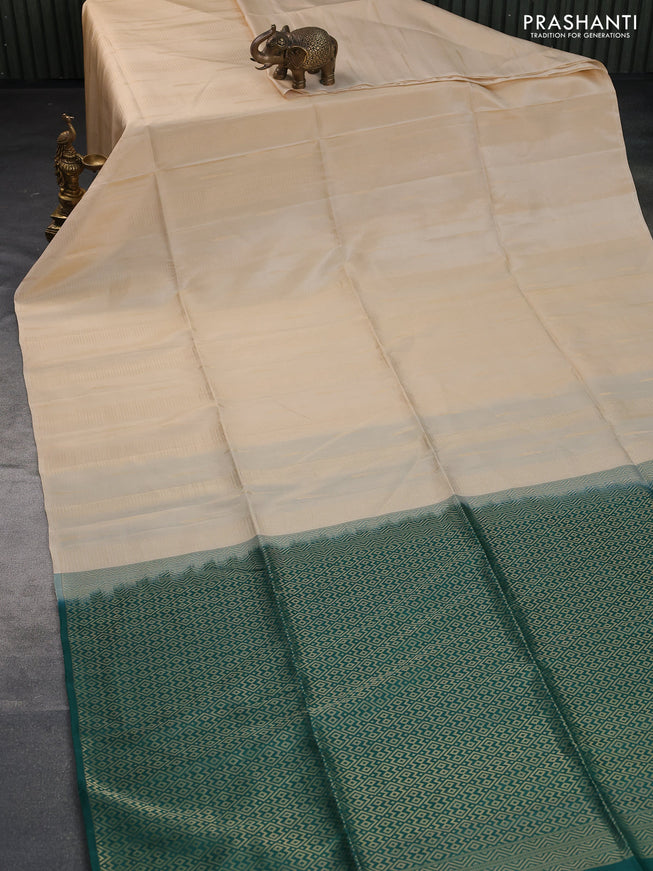 Kanchipuram soft silk saree cream and dark green with allover zari weaves & buttas in borderless style