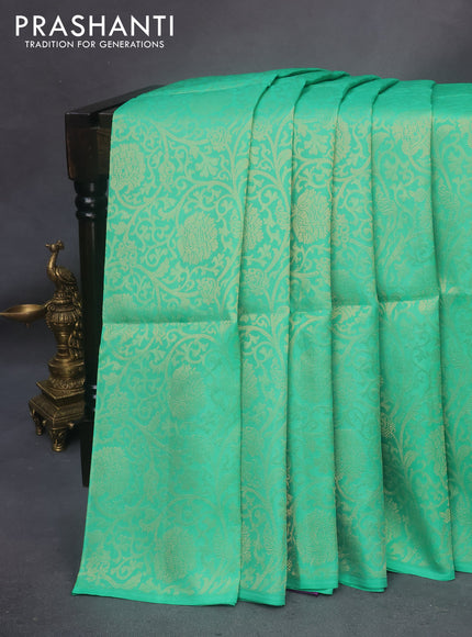 Kanchipuram soft silk saree teal green and purple with allover zari woven brocade weaves in borderless style