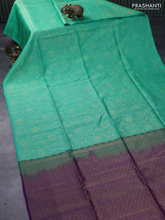 Kanchipuram soft silk saree teal green and purple with allover zari woven brocade weaves in borderless style