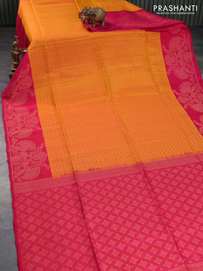 Kanchipuram soft silk saree dual shade of mustard yellow and pink with allover zari woven brocade weaves and zari woven border