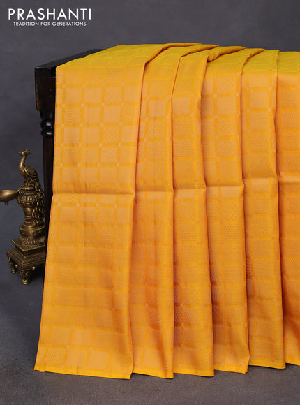 Kanchipuram soft silk saree mango yellow and dark green with allover zari woven brocade weaves in borderless style