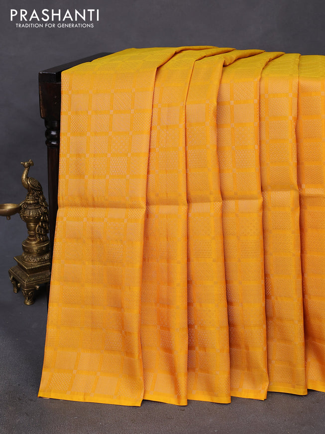 Kanchipuram soft silk saree mango yellow and dark green with allover zari woven brocade weaves in borderless style