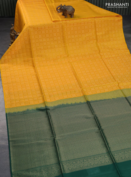 Kanchipuram soft silk saree mango yellow and dark green with allover zari woven brocade weaves in borderless style