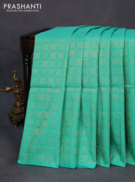 Kanchipuram soft silk saree teal green shade and pastel pach with allover zari woven brocade weaves in borderless style