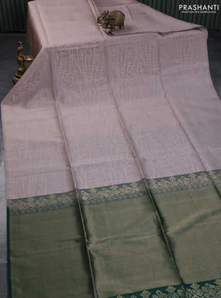 Kanchipuram soft silk saree beige and dark green with allover zari woven brocade weaves in borderless style