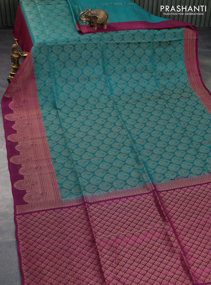 Kanchipuram soft silk saree peacock green and purple with allover zari woven brocade weaves and long zari woven border