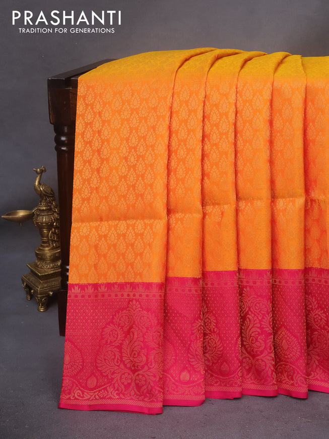 Kanchipuram soft silk saree mango yellow and pink with allover zari woven brocade weaves and zari woven border