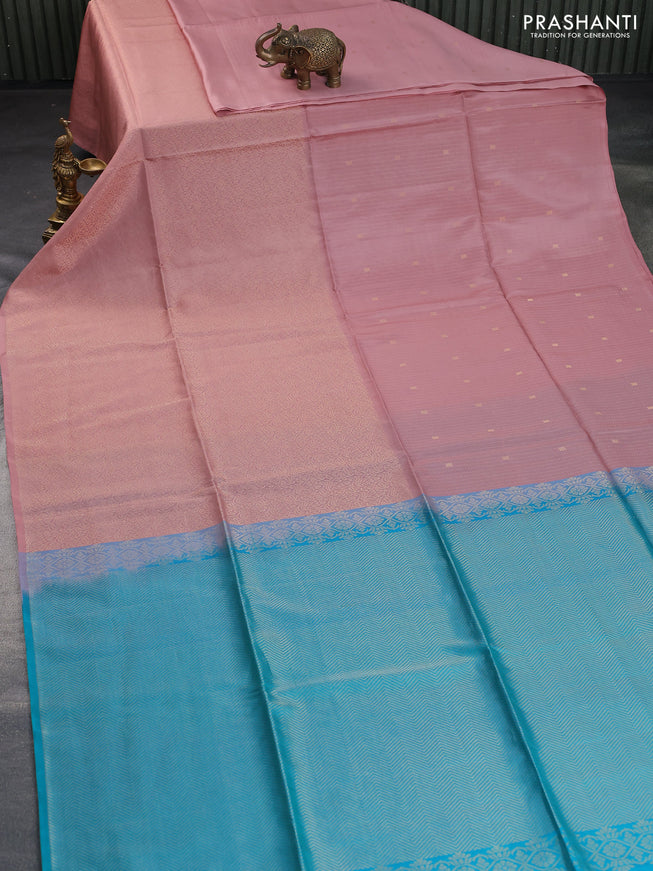 Kanchipuram soft silk saree pastel pink and dual shade of teal blue with half and half style and long zari woven border