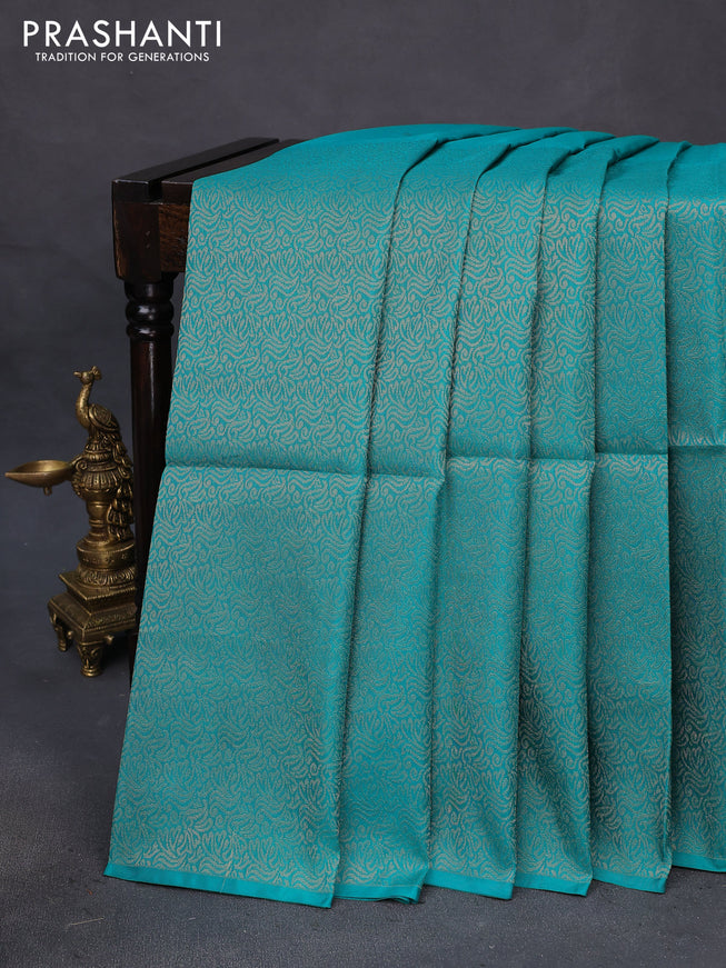 Kanchipuram soft silk saree teal green and light pink with half and half style and long zari woven border