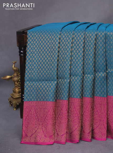 Kanchipuram soft silk saree peacock blue and dark magenta pink with allover zari woven brocade weaves and zari woven border