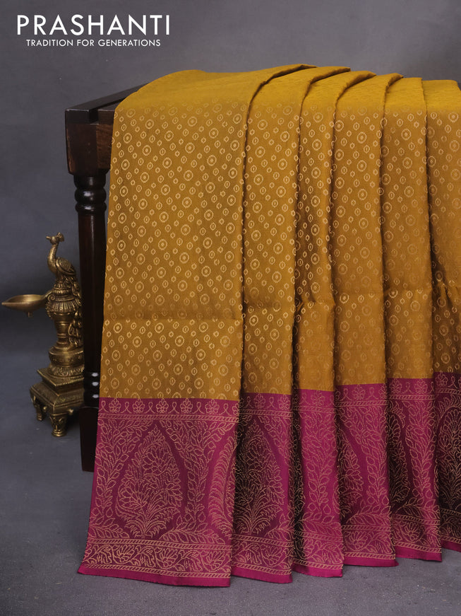 Kanchipuram soft silk saree dark mustard and dark magenta pink with allover zari woven butta weaves and rich zari woven border