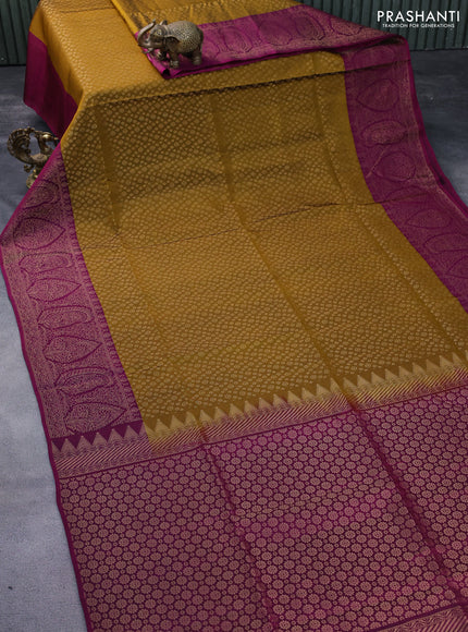 Kanchipuram soft silk saree dark mustard and dark magenta pink with allover zari woven butta weaves and rich zari woven border