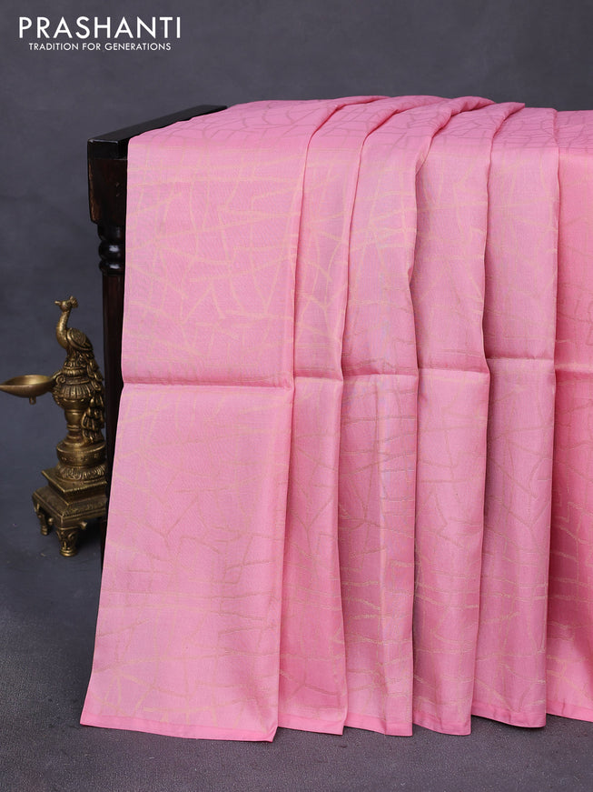 Kanchipuram soft silk saree light pink and green with allover zari weaves in borderless style