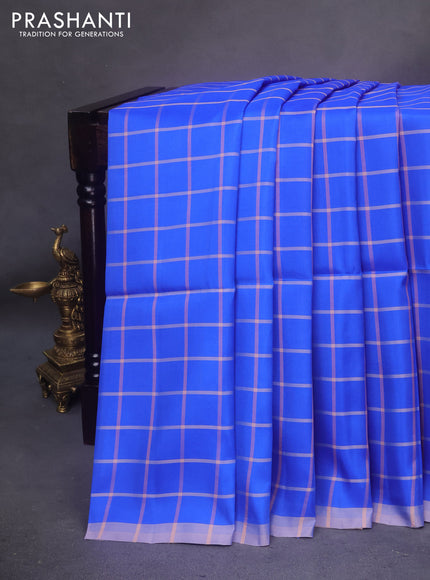 Kanchipuram soft silk saree royal blue and pastel brown with allover checked pattern and simple border