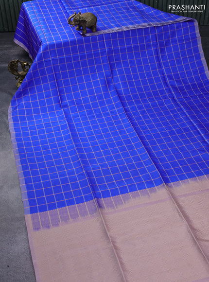 Kanchipuram soft silk saree royal blue and pastel brown with allover checked pattern and simple border