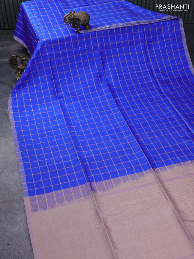 Kanchipuram soft silk saree royal blue and pastel brown with allover checked pattern and simple border