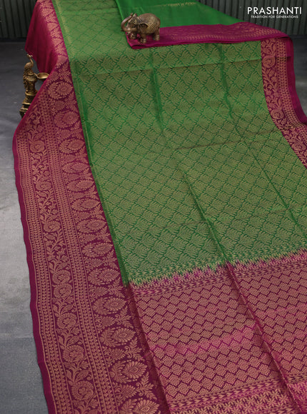 Kanchipuram soft silk saree green and dark magenta pink with allover zari woven brocade weaves and long zari woven border