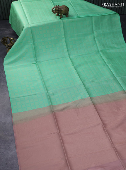 Kanchipuram soft silk saree pastel green and mild peach shade with allover zari woven brocade weaves in borderless style