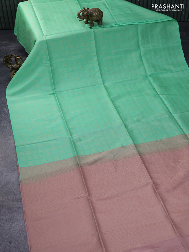 Kanchipuram soft silk saree pastel green and mild peach shade with allover zari woven brocade weaves in borderless style