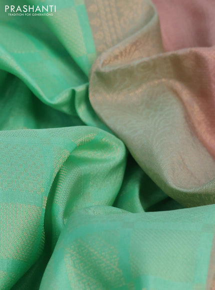 Kanchipuram soft silk saree pastel green and mild peach shade with allover zari woven brocade weaves in borderless style