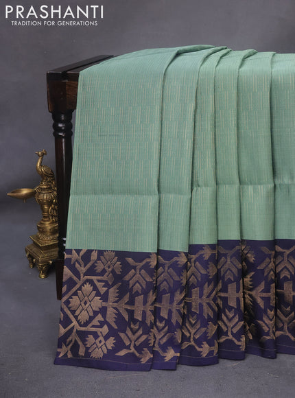 Kanchipuram soft silk saree pastel green and dark blue with allover zari weaves and zari woven border