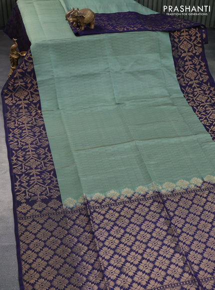 Kanchipuram soft silk saree pastel green and dark blue with allover zari weaves and zari woven border