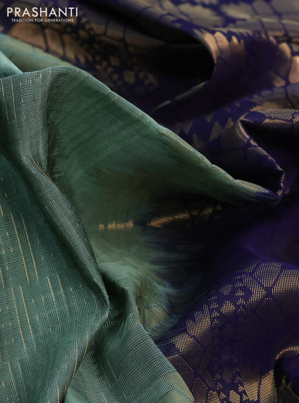 Kanchipuram soft silk saree pastel green and dark blue with allover zari weaves and zari woven border