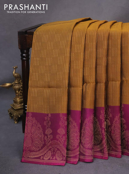 Kanchipuram soft silk saree dark mustard and magenta pink with allover zari weaves and zari woven border